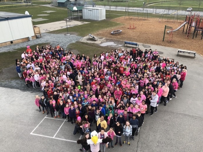 A group of people in pink

Description automatically generated, Picture